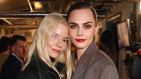 cara delevingne and anya taylor joy|Cara Delevingne gets help with her dress from Anya Taylor.